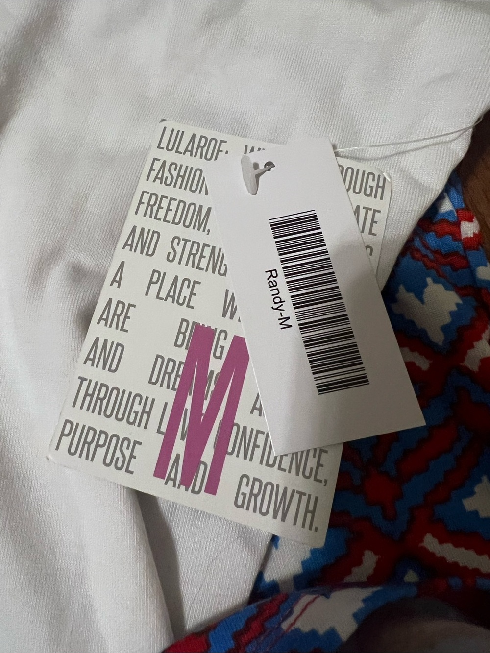 LuLaRoe White Raglan Top with Blue and Red Geometric Print - Picture 5 of 5
